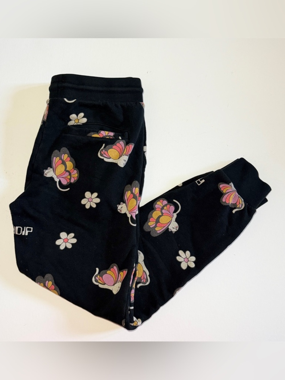 Ripndip Black Sweatpants with Pink & Yellow Butterfly Cat and White Daisy Print - Picture 4 of 9